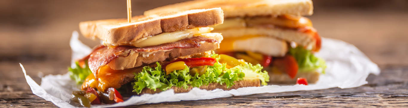 Staked to perfection: indulge in the ultimate club sandwich experience