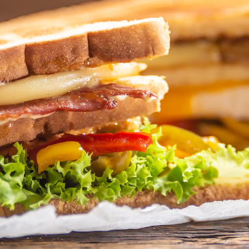 Staked to perfection: indulge in the ultimate club sandwich experience